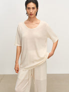 MSBEAST Melange Wool Linen Scoop Neck T Shirt in White - On Female Model