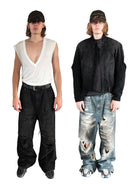 UNKNOWNWORLD Distressed Boro Mud Dyed Jeans in Denim - On Male Model