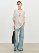 MSBEAST Sheer Lyocell Cashmere Half Sleeve T Shirt in White - On Female Model