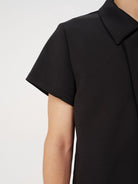 JCAESAR STUDIO Asymmetric Concealed Button Short Sleeve Shirt in Black - On Model