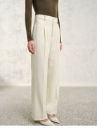 TEASEL Textured Wool Pleated Trousers in Cream - On Female Model