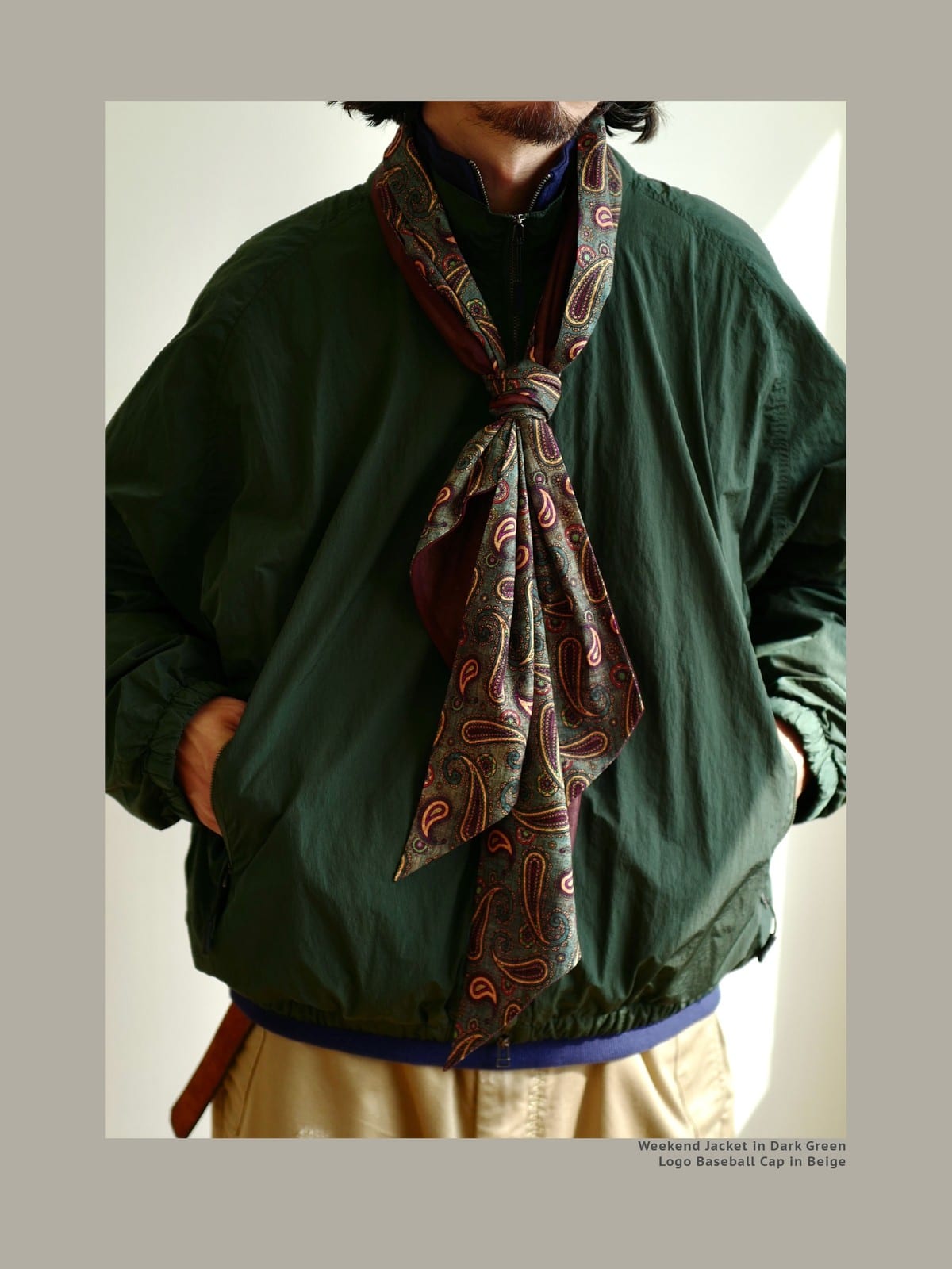 USAGE Lightweight Nylon Zip Up Jacket in Green - On Male Model