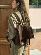 QIUZHEN Vegetable Tanned Goatskin Messenger Backpack in Brown - On Female Model