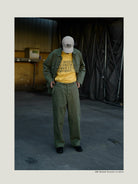 USAGE Heavyweight Herringbone Twill Belted Trousers in Olive - On Male Model