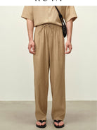 ROYA Linen Blend Drawstring Trousers in Beige - On Male Model