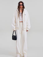 SMFK Embroidered Cotton Zip Up Hoodie in White - On Female Model
