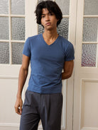 Retro 21 Anti Wrinkle V Neck T Shirt in Navy Blue - On Male Model