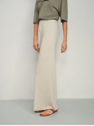 TEASEL Cooling Wide Leg Trousers in Cream - On Female Model