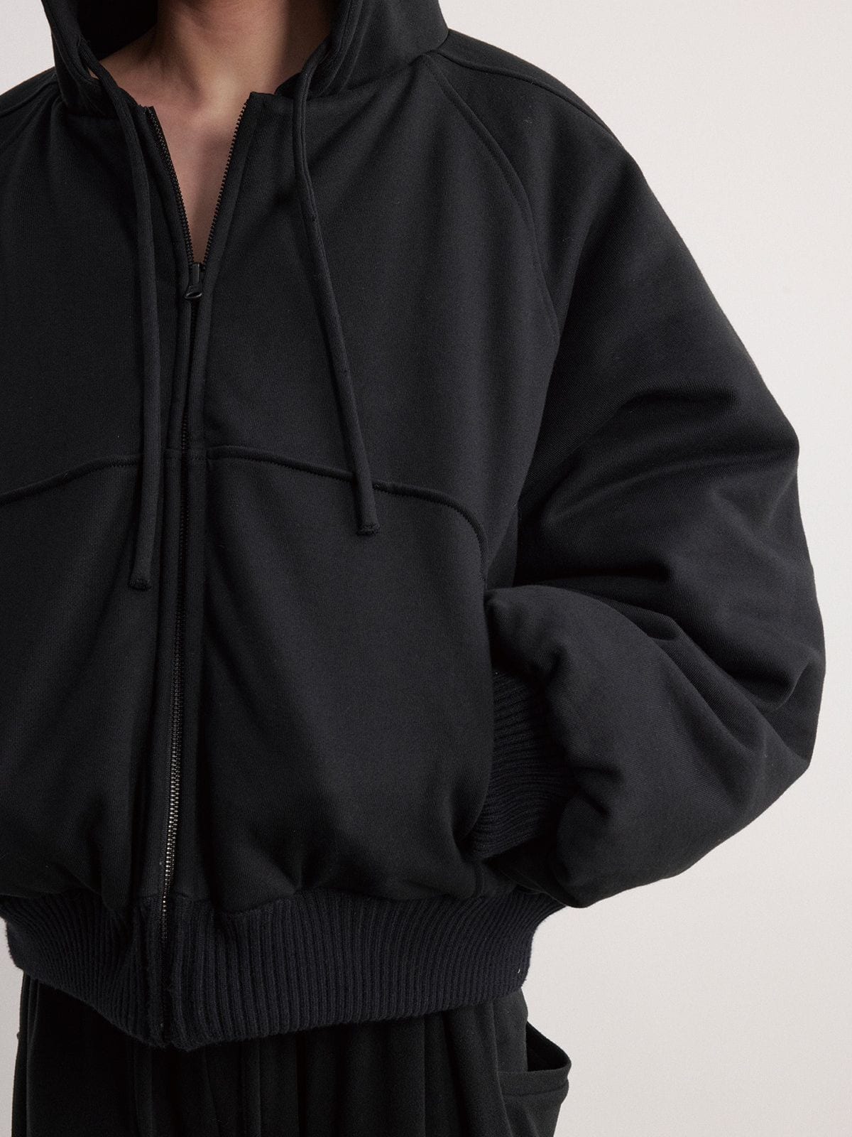 JCAESAR STUDIO Reversible Hooded Nylon Bomber in Black - On Model