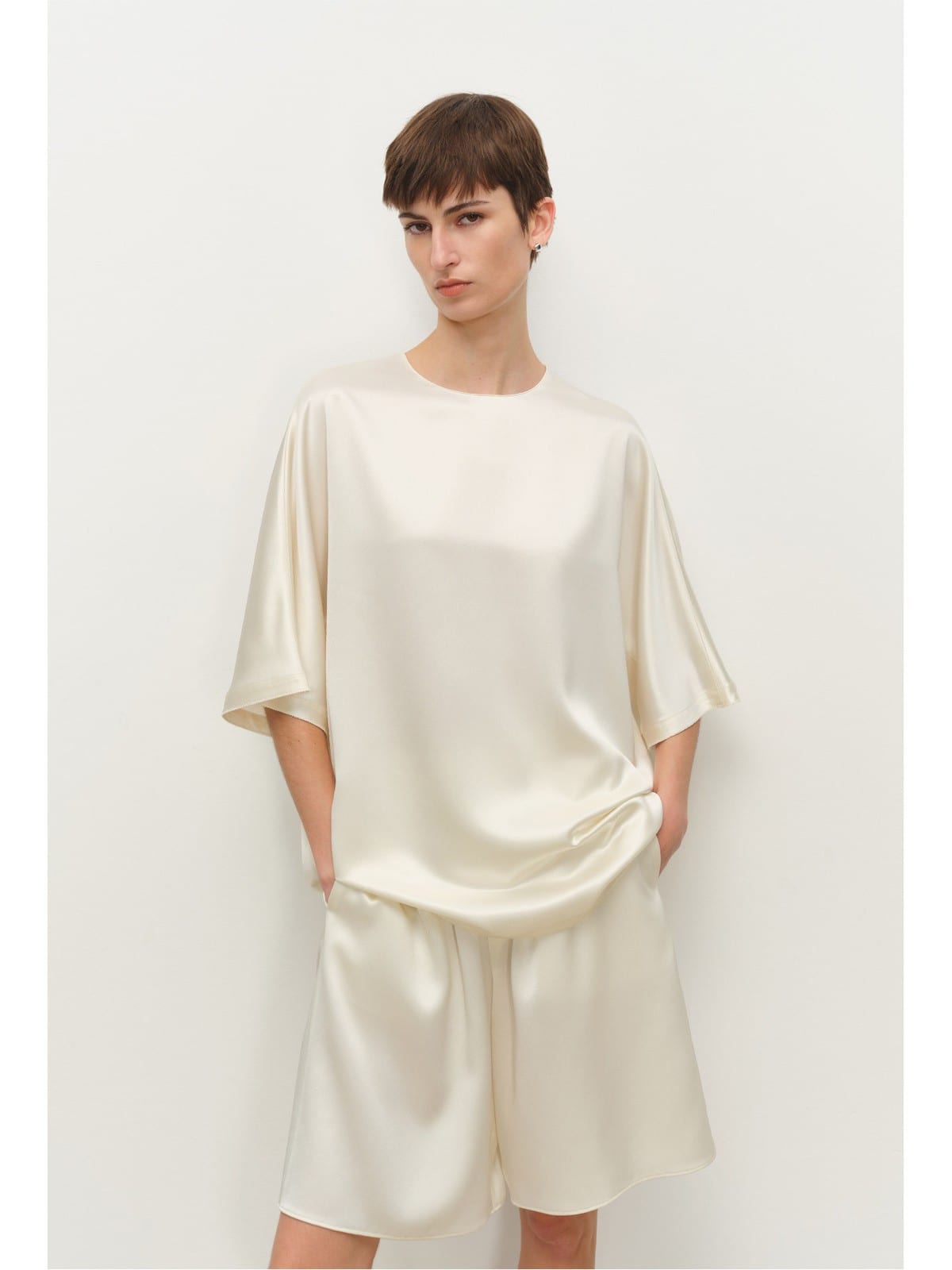 MSBEAST Oversized Acetate Satin T Shirt in White - On Female Model