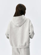 MEDM Embroidered Cotton Blend Zip Up Hoodie in Beige - On Model