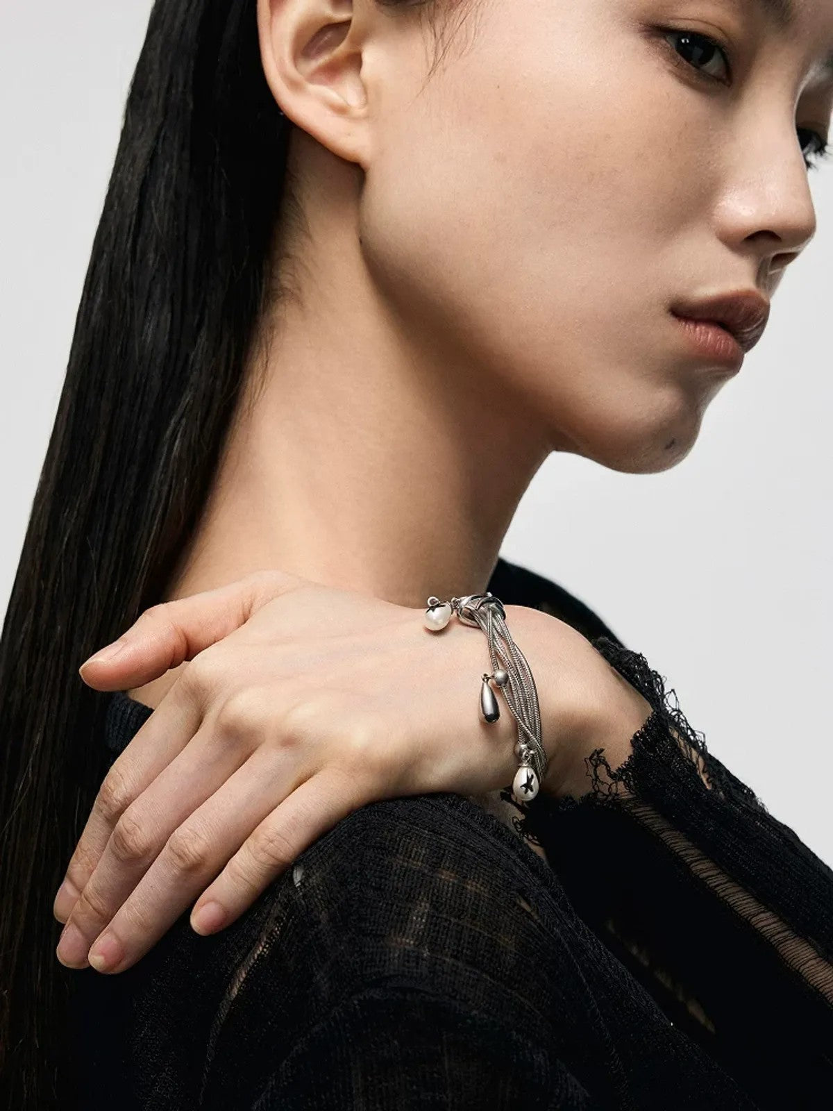 BLACKHEAD Multi Chain Teardrop Pearl Bracelet in Silver - On Female Model