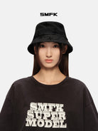 SMFK Distressed Frayed Denim Bucket Hat in Black - On Female Model