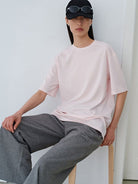 MSBEAST Oversized Lyocell Wool Blend T Shirt in Pink - On Female Model