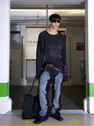 TRIANGLE PROJECT Deconstructed Patchwork Micro Flare Jeans in Black - On Male Model
