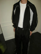 AFterTaste Oversized Zip Up Track Jacket in Black - On Male Model