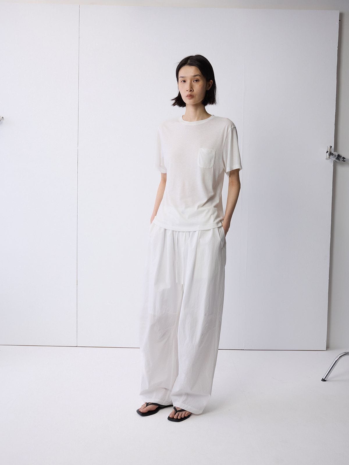 Random Piece Linen Blend Pocket T Shirt in White - On Female Model