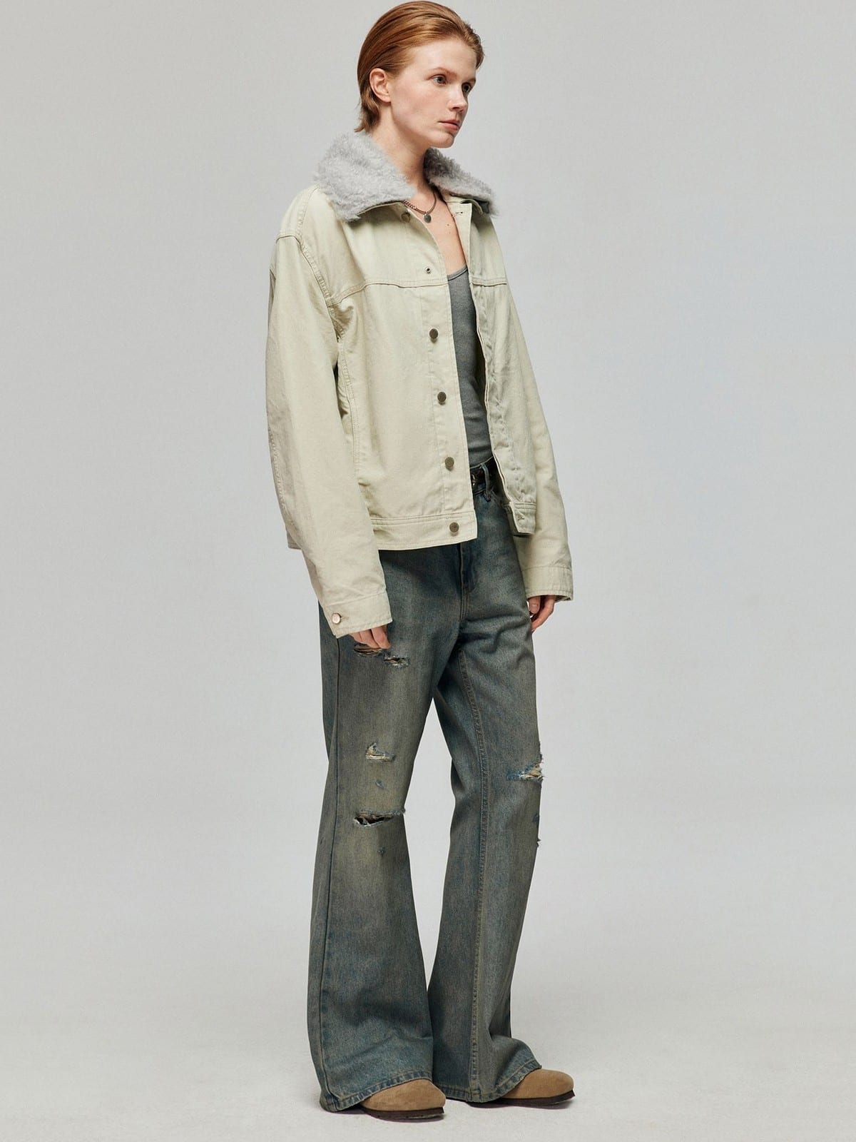 SIMPLE PROJECT Distressed Vintage Wash Flare Jeans in Blue - On Female Model