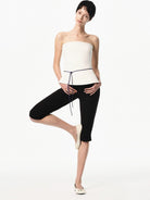 RARELY ALIKE Viscose Blend Belted Cropped Pants in Black - On Female Model