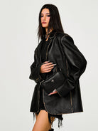 SMFK Cross Badge Leather Shoulder Bag in Black - On Female Model