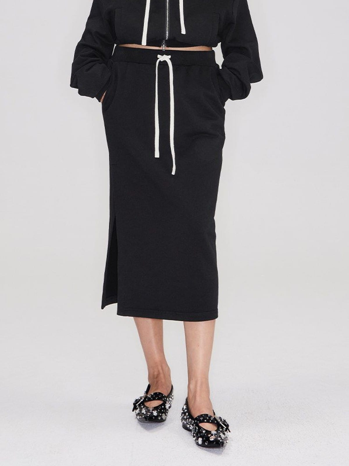 RARELY ALIKE Cotton Side Slit Midi Skirt in Black - On Female Model