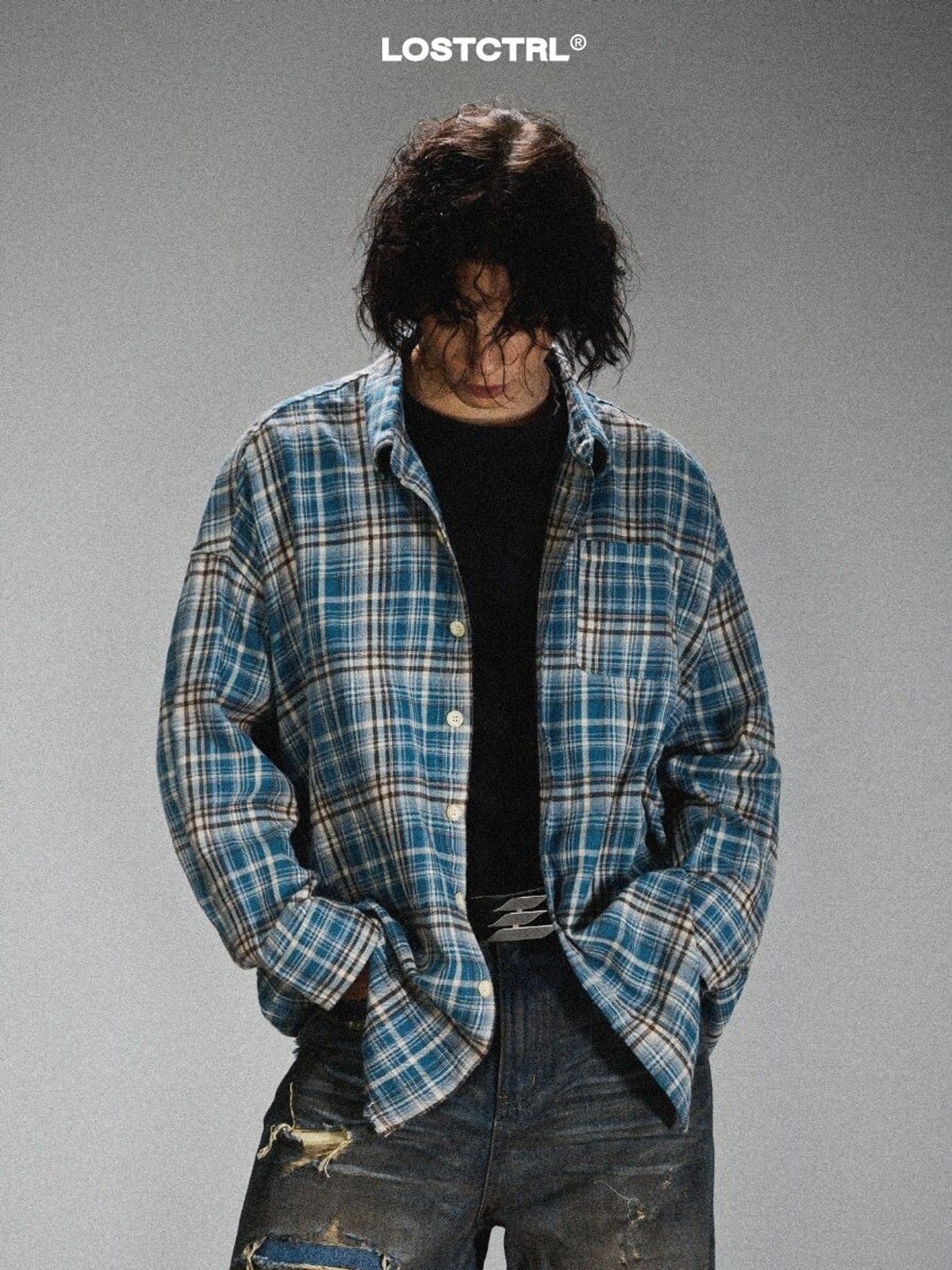 LOSTCTRL Frayed Asymmetric Plaid Shirt in Blue - On Male Model