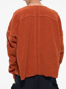 D5ove Distressed V Neck Fleece Sweatshirt in Orange - On Model