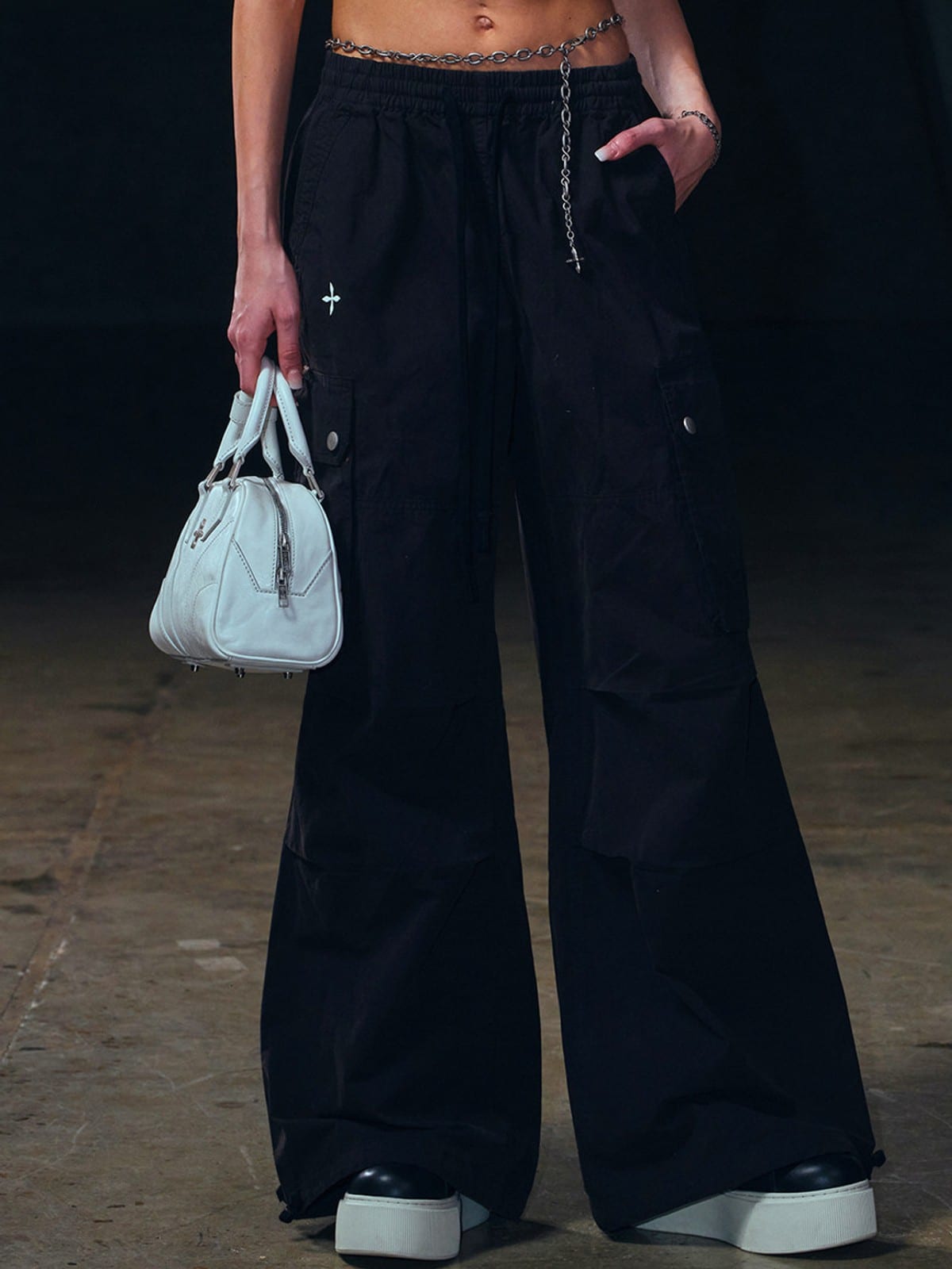 SMFK Garment Dyed Cargo Parachute Pants in Black - On Female Model