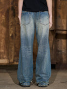BLINDNOPLAN Distressed Washed Straight Jeans in Blue - On Model