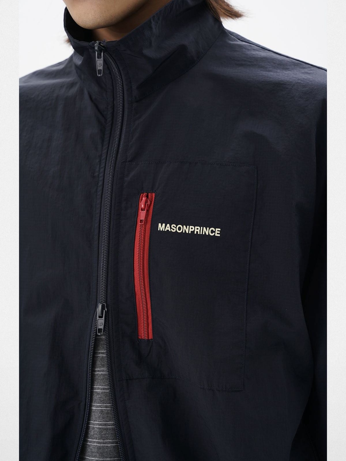 MASONPRINCE Lightweight Tonal Check Nylon Jacket in Navy Blue - On Male Model