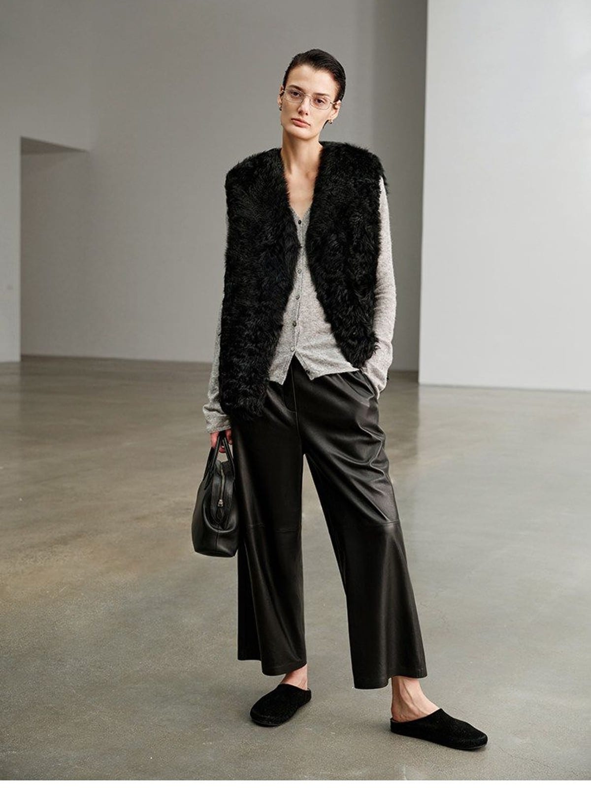 MSBEAST Cropped Wide Leg Leather Trousers in Black - On Female Model