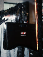 BLINDNOPLAN Textured Faux Leather Asymmetric Tote in Black - Lifestyle