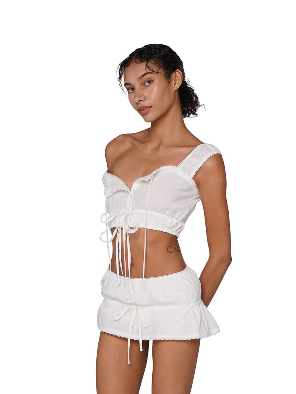 SweetChilling Tie Front Ruffled Mini Skirt in White - On Female Model