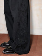 MEDM Embroidered Cotton Cargo Pants in Black - On Model