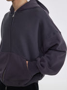 AFterTaste Washed Distressed Zip Up Hoodie in Gray - On Male Model