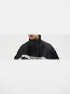 BLINDNOPLAN Reflective Strip Stand Collar Jacket in Black - On Male Model
