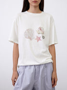 Random Piece Shell Print Cotton Lyocell T Shirt in Cream - On Female Model