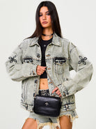 SMFK Small Leather Badge Chain Crossbody in Black - On Female Model