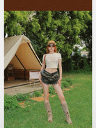 BeerBro Distressed Raw Hem Denim Shorts in Denim - On Female Model