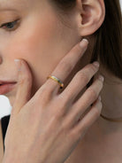 BLACKHEAD Two Tone Engraved Steel Ring in Yellow - On Female Model