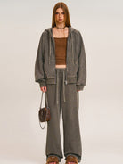 SMFK Distressed Washed Cotton Zip Up Hoodie in Dark Gray - On Female Model