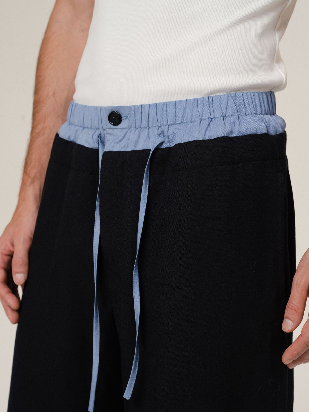 Retro 21 100 Italian Wool Double Waistband Trousers in Black - On Male Model