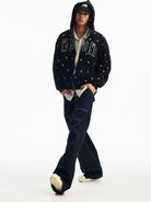 MEDM Fleece Lined Star Print Zip Hoodie in Black - On Male Model