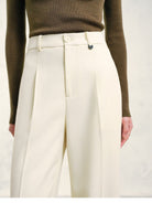 TEASEL Textured Wool Pleated Trousers in Cream - On Model