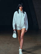 SMFK Asymmetric Zip Cotton Track Jacket in White - On Female Model
