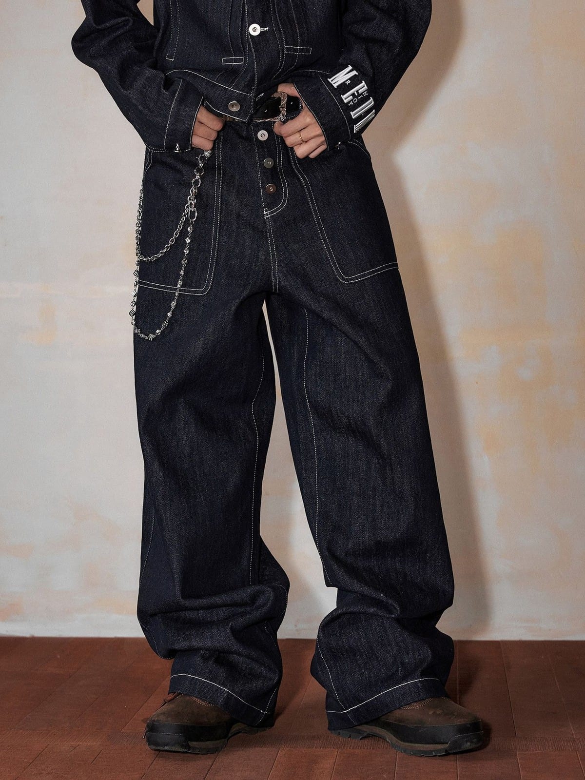 MEDM Contrast Stitch Raw Denim Jeans in Blue - On Model