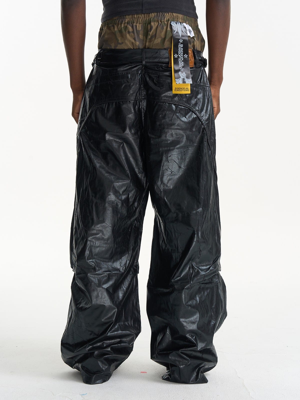 BLINDNOPLAN Faux Leather Layered Cargo Pants in Black - On Model
