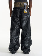 BLINDNOPLAN Faux Leather Layered Cargo Pants in Black - On Model
