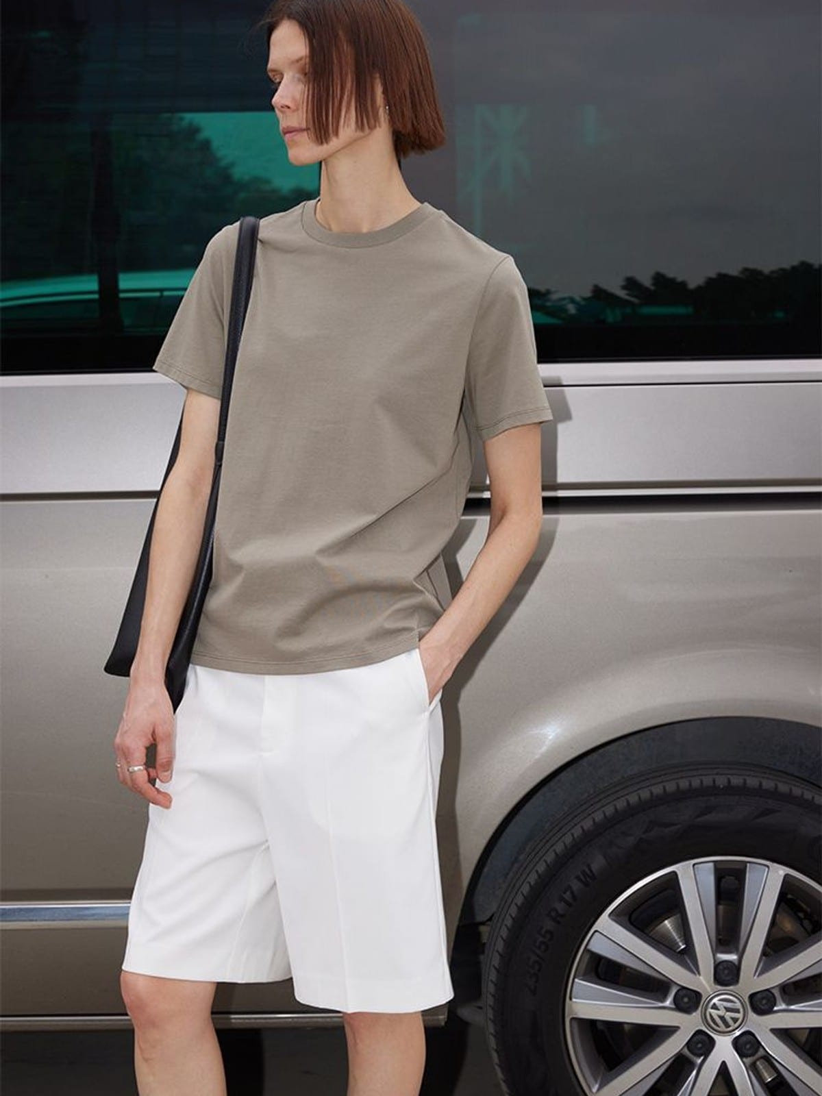 RARELY ALIKE Tailored Bermuda Shorts in White - On Female Model