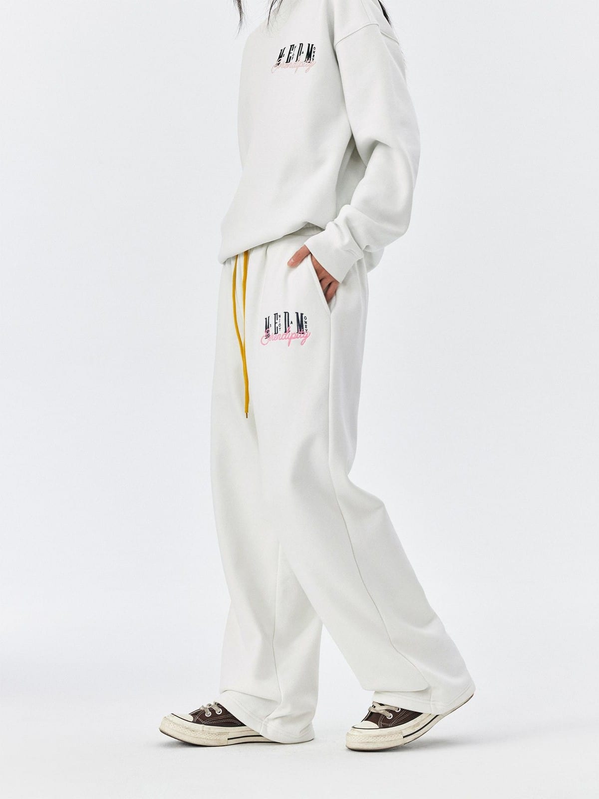 MEDM Fleece Lined Embroidered Sweatpants in White - On Female Model